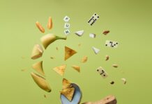 면역력을 높이는 습관: 식단과 운동의 역할 a wooden board topped with lots of different types of food