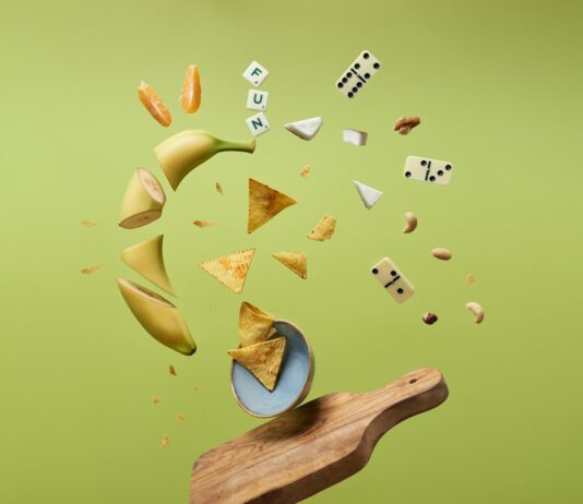 면역력을 높이는 습관: 식단과 운동의 역할 a wooden board topped with lots of different types of food