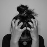 “스트레스, 일상 속 작은 변화로 다스린다” a woman covering her face with her hands