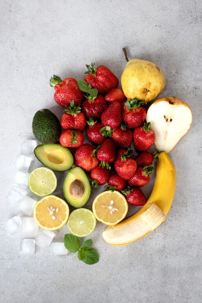 Photo by Tetiana Bykovets strawberries and bananas on white table