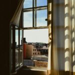 나만의 모닝 루틴, 건강에 꼭 필요한 이유와 실천 팁 a view of a city through a window